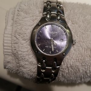 Kenneth Cole watch. Blue/purple face.